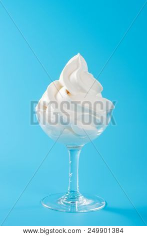 Soft serve ice cream isolated with colored background, copy space(text space), blank for text, vanil