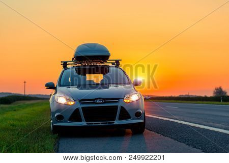 Moscow, Russia - August 10, 2017: Gray Ford Focus Car Hatchback On An Empty Road At Dawn