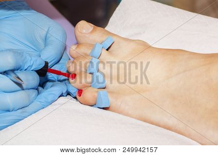Woman Feet Receiving Pedicure. Close Up Concept