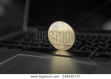 Dash Coin Symbol On Laptop. Concept Financial Currency, Crypto Currency Sign. Blockchain Mining. Dig