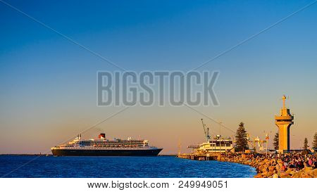 Adelaide, Australia - February 16, 2018: Cunard Line Rms Queen Mary 2 With People On Board Departing