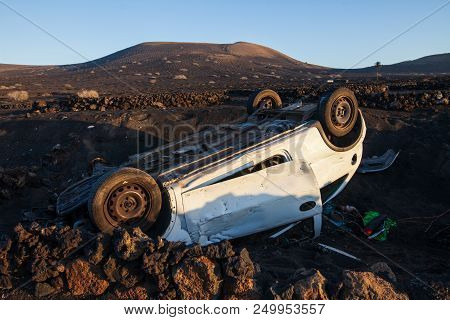 Car Accident. Crashed And Overturned Automobile In Lanzarote