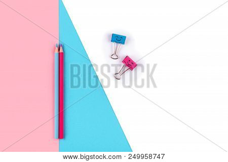 Top View Of Pens On Colorful Background Pink Blue With Copy Space.