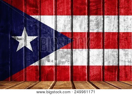 Wooden Background With A Flag Of Puerto Rico. There Is A Place For Your Text In The Photo.