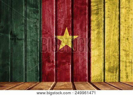 Wooden Background With A Flag Of Cameroon. There Is A Place For Your Text In The Photo.