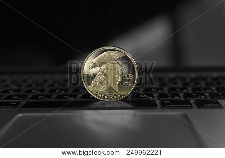 Titan Bitcoin Coin Symbol On Laptop. Concept Financial Currency, Crypto Currency Sign. Blockchain Mi