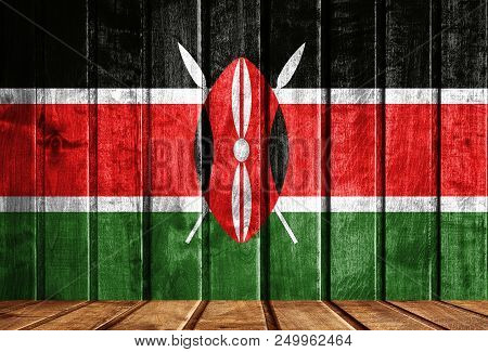Wooden Background With A Flag Of Kenya. There Is A Place For Your Text In The Photo.