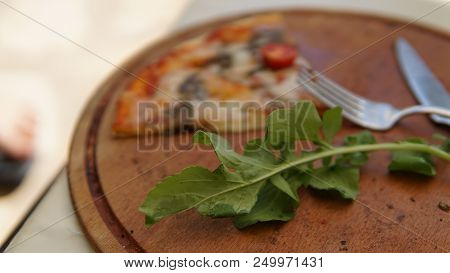 Deicious Pizza On The Table With Colorfull Background