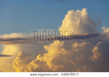 Heapy Clouds With Warm Sunset's Ray.