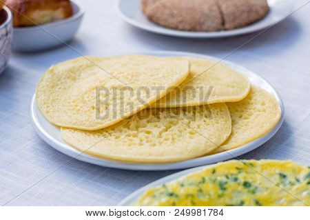 Beghrir Or Baghrir (moroccan Pancakes) On Whte Plate.
