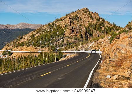 Trail Ridge Road, the highest (12,183 feet) continuous highway in the USA in high alpine tundra with rocks and mountains at autumn. Rocky Mountain National Park in Colorado, USA. 