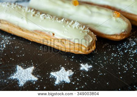 Traditional French Eclairs With Chocolate. Tasty Dessert. Home Made Cake Eclairs
 Sweet. Dessert. Pa