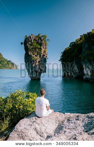 Young Men On Vacation In Thailand Visiting The Bay Of Phannga Famous For Its James Bond Island And V