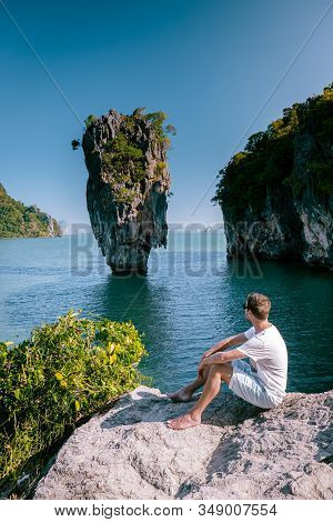 Young Men On Vacation In Thailand Visiting The Bay Of Phannga Famous For Its James Bond Island And V