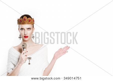 Frustrated Beauty Queen Speaking On Microphone Gesturing Anger With Hand Isolated White Background W