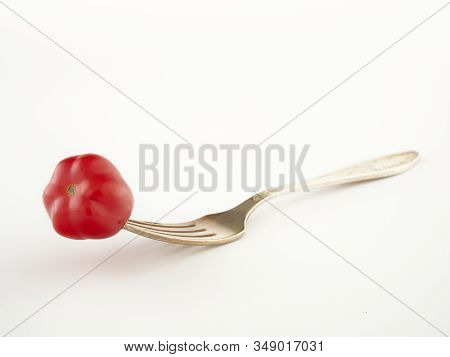 Ripe, Red Cherry Tomatoes Of The Confetto Variety.isolate.white Background
