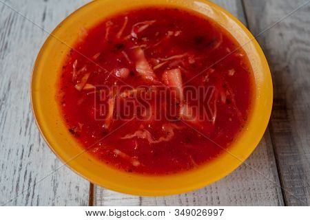 Traditional Ukrainian Russian Vegetable Borscht On The Old Wooden Background. Borscht. Borsch With Q