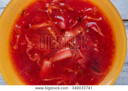 Traditional Ukrainian Russian Vegetable Borscht On The Old Wooden Background. Borscht. Borsch With Q