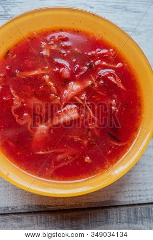 Traditional Ukrainian Russian Vegetable Borscht On The Old Wooden Background. Borscht. Borsch With Q