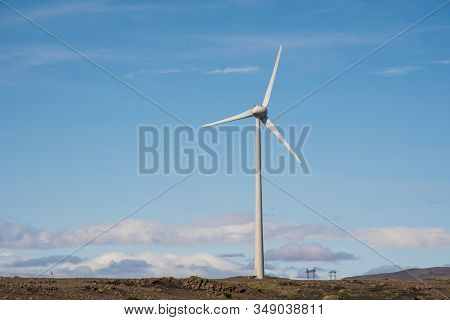 Windmill In The Landscape Of South Iceland On A Sunny Summer Day