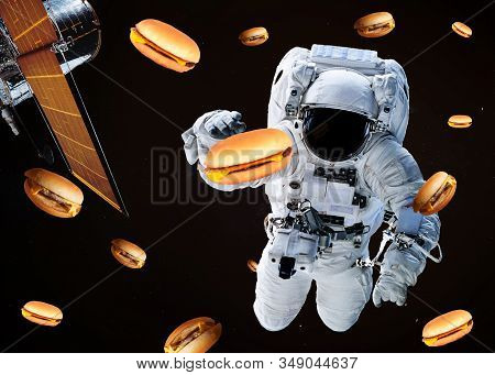 Satellite Telescope Near To Astronaut With Burgers Somewhere In Space. Science Fiction Wallpaper. El