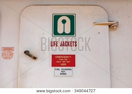 Close Up Of The Door Of The Life Jacket Compartment Room On A Passenger Ferryboat In Canada. White A