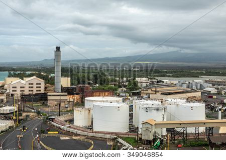 Kahului, Maui,, Hawaii, Usa. - January 13, 2020: Big White Fuel Tanks And Old Sugarcane Processing P