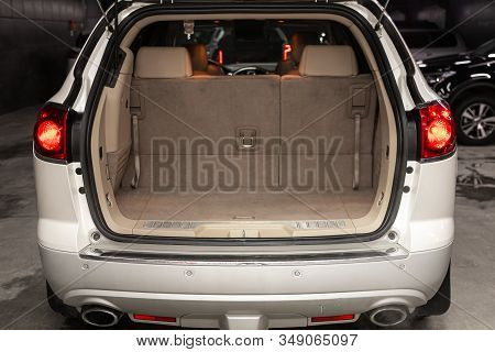 Novosibirsk, Russia - December 29, 2019:   Buick Enclave, Close-up Of The Open Trunk, Headlight, Bum