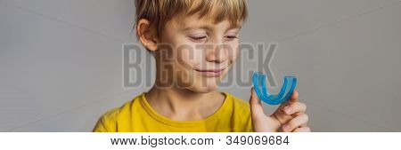 Six-year Old Boy Shows Myofunctional Trainer. Helps Equalize The Growing Teeth And Correct Bite, Dev