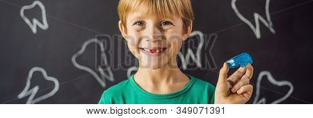 Banner, Long Format Six-year Old Boy Shows Myofunctional Trainer. Helps Equalize The Growing Teeth A