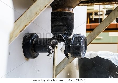 At The University In A Lab There Is A Burnt-out Drain Pipe Due To A Chemical Reaction