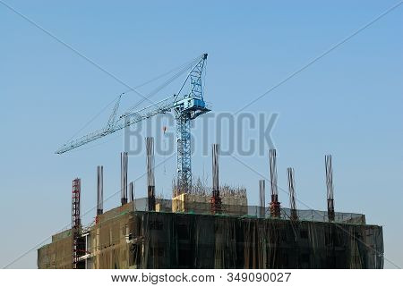 Tower Crane In The Building Construction Area.
Tower Crane Is Used For The Construction Of Tall Buil