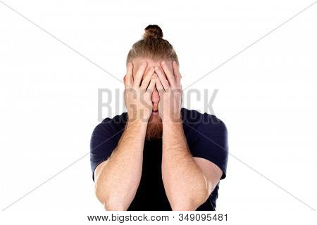 Red haired man with long beard covering his eyes isolated on a white background