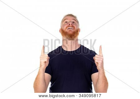 Red haired man with long beard looking up isolated on a white background