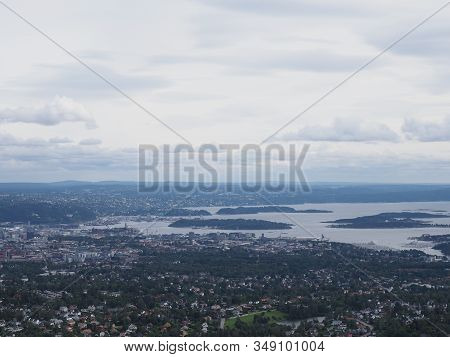 Norwegian Panorama Of Fjord Near European Town Of Oslo In Holmenkollen District In Norway With Overc
