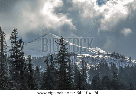 Kedarkantha Summit Against Sky In Garhwal Himalayas