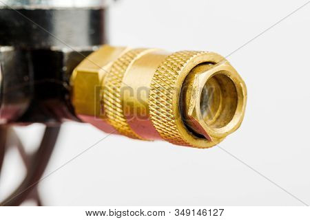 Air Compressor. An External Compressor. Industrial Compressor In Red On A White Background.