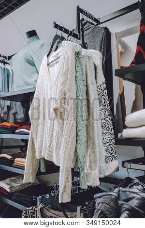 Sustainable Living, Zero Waste Wardrobe. Secondhand Fashion. Various Clothes On Hangers On Shelves A