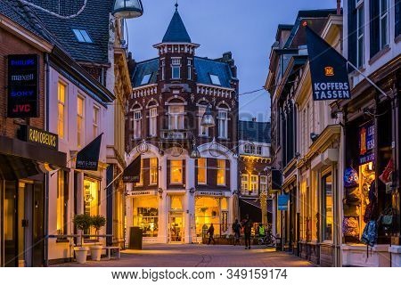 Lighted City Street In Tilburg Outdoor Shopping Center, Illuminated Architecture In The Evening, Til