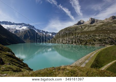 Lake Goeschenen At The Goescheneralp With The Dam On The Rigth Side