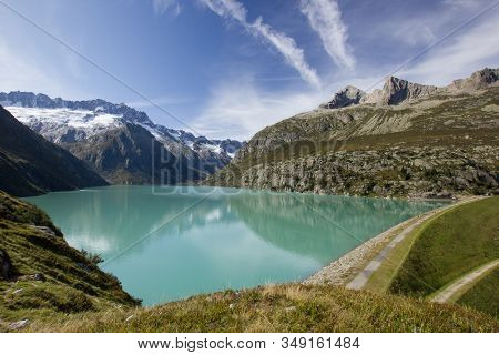Lake In The Swiss Mountains On A Sunny Summer Day