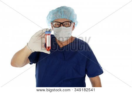 2019 Novel Coronavirus. 2019-nCoV.  Wuhan, China Coronavirus. Doctor or Medical Scientist examines a vile of blood infected with the Wuhan, China Coronavirus. Doctor in Protective Scrubs with virus.  