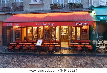 Paris, France-february 02 ,2020 : Cafe Le Sabot Rouge At Rainy Morning . It Is A Traditional French 