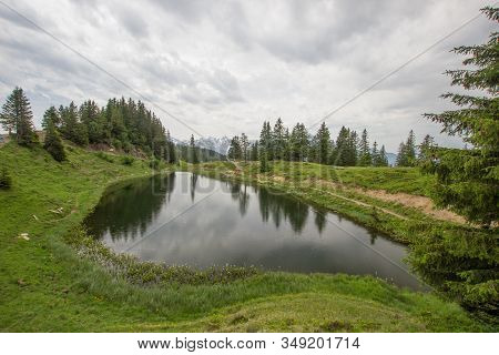 Lake Flesch In The Swiss Mountains On A Cloudy Day