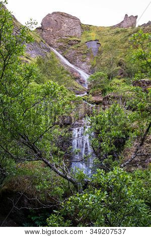 Waterfall Systrafoss In Kirkjubaejarklaustur In South Iceland On A Summe Revening