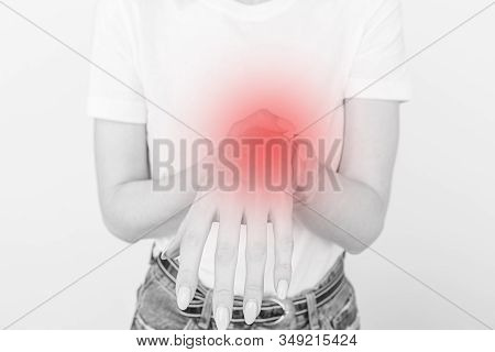 Elderly Woman Suffering From Pain, Weakness And Tingling In Wrist. Causes Of Hurt Include Osteoarthr