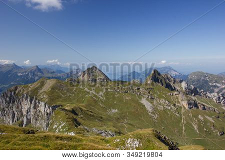 Panorama Of Mountains In Switzerland On A Sunny Day In Summer