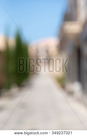 Abstract Blur Background Of Urban City In Summer Day, Vertical. Deserted Street