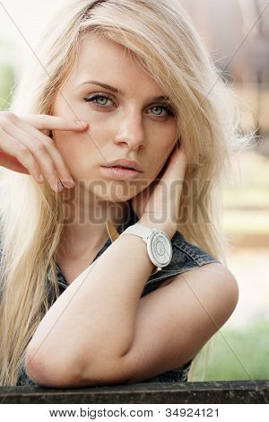 Portrait of a beautiful young girl close-up