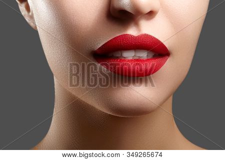 Sexy Part Of Female Face With Plump Red Lips, Perfect Chin Shapes And Smooth Skin. Fashion Lip Make-